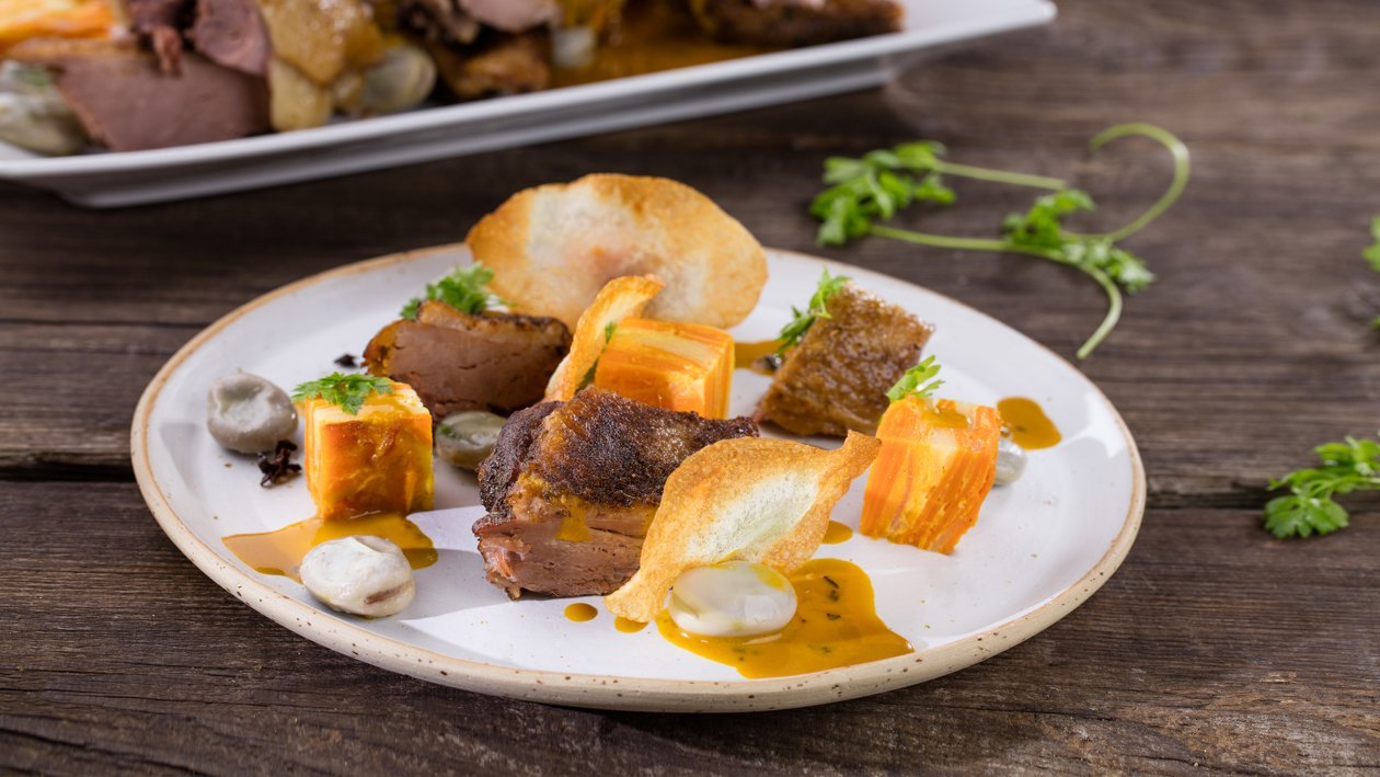 Confit žąsis su šaltalankiais ir juodosiomis voveraitėmis – - Receptas